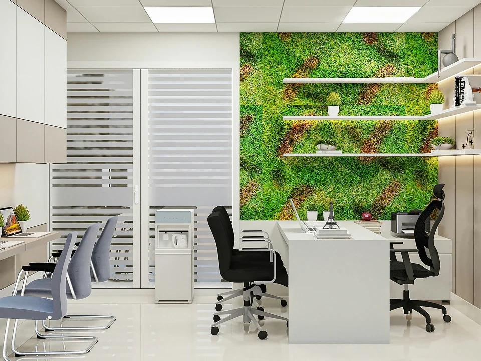 Ufficio moderno con parete verde decorata e opere d'arte alle pareti
